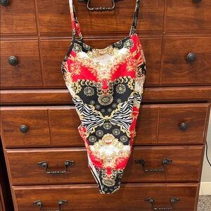 Women’s one piece swimsuit. Slim fitting in the right places!